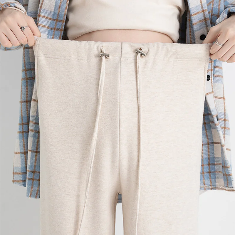 Pantalones de maternidad de seda con cintura alta y pernera ancha