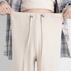 Pantalones de maternidad de seda con cintura alta y pernera ancha