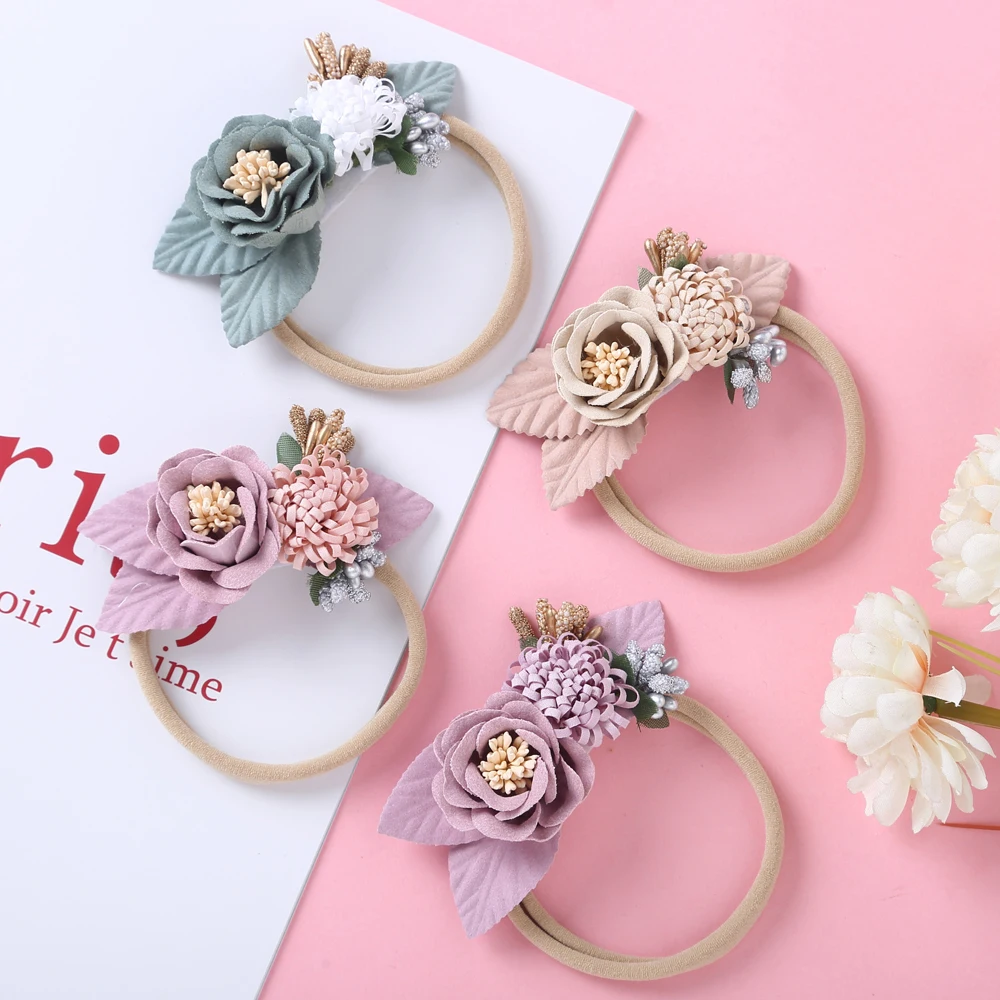Diadema nailon con flores para niña – Accesorio suaverecién nacida