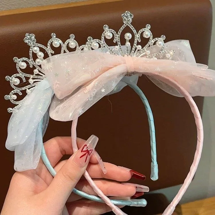 Detalle del aro y el lazo con acabado de perlas