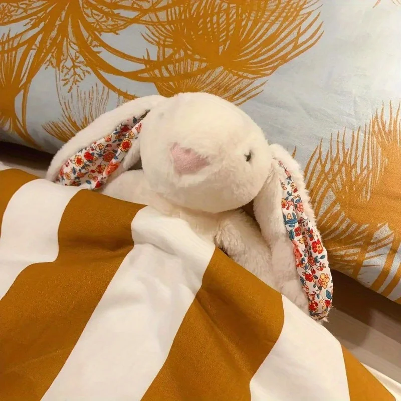 Conejo de peluche suave y tierno para niños