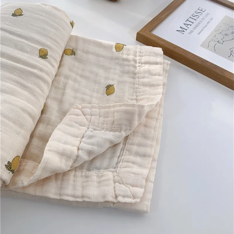 Manta envolvente de muselina orgánica bebé estilo floral cereza y limón