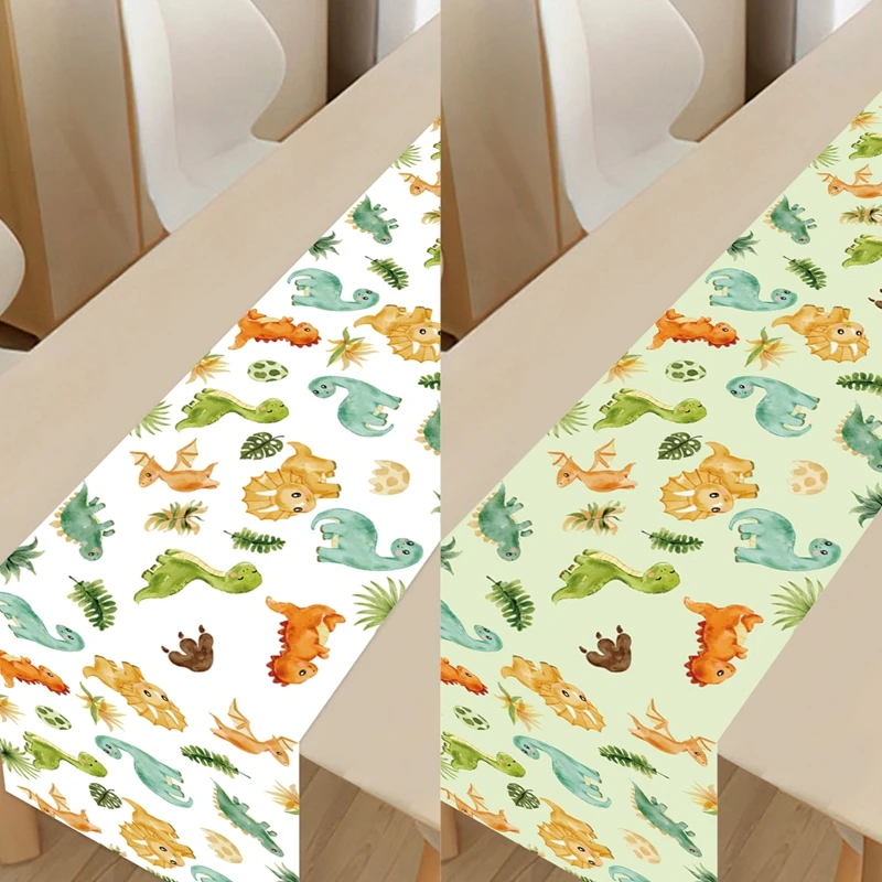 Mesa decorada con temática prehistórica para fiestas infantiles