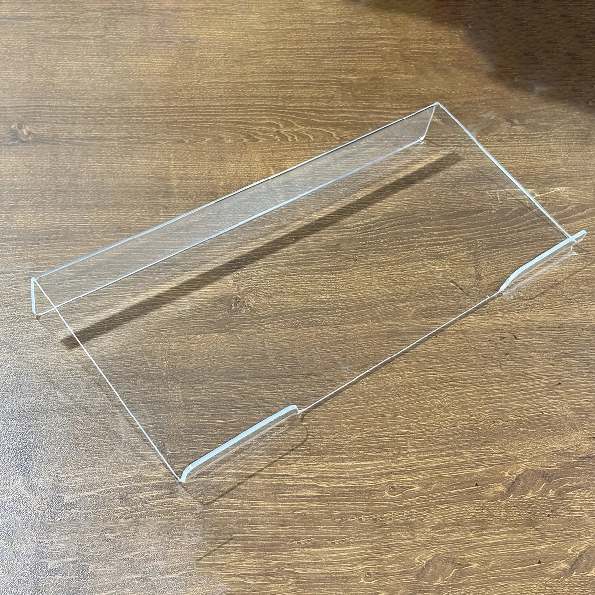 Soporte para teclado de acrílico inclinable para escritura ergonómica