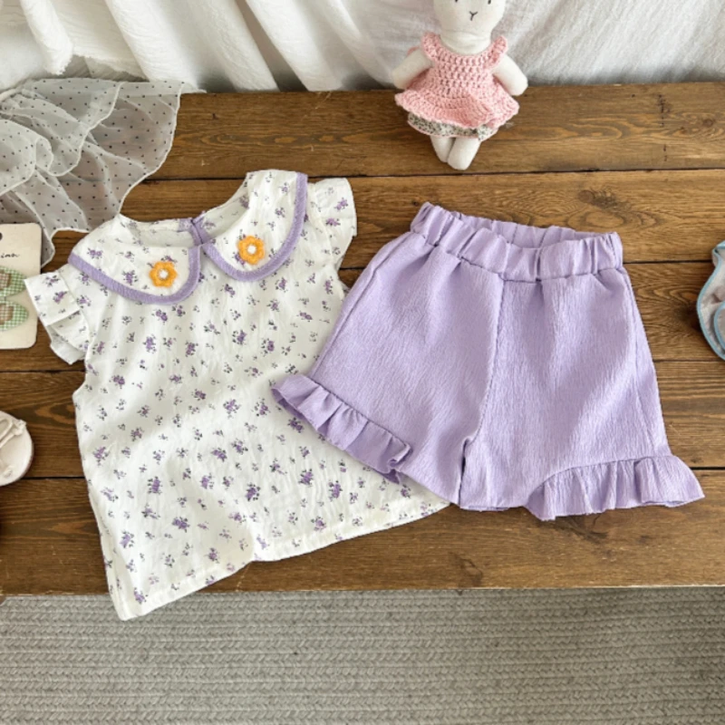 Conjunto de bebé veraniego con chaleco floral y pantalón corto - imagen 3