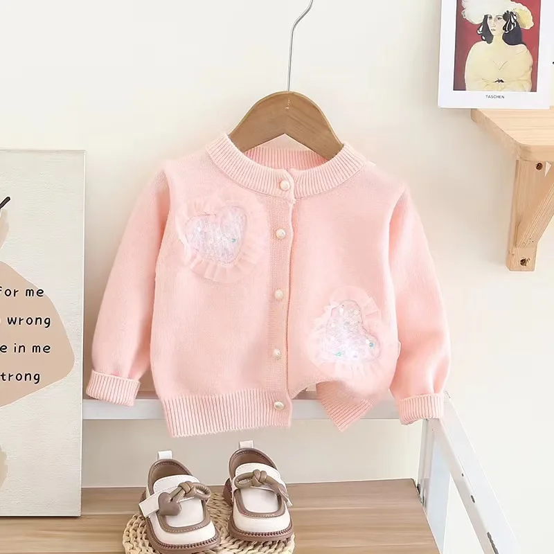 Conjunto suéter y falda niña