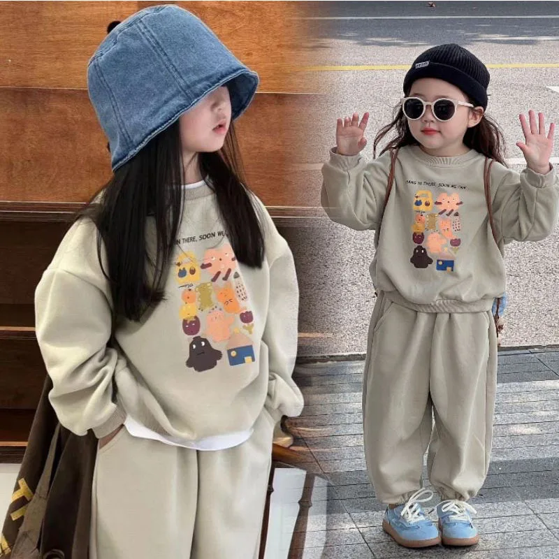 Conjunto de niña con suéter estampado y pantalón tipo chándal