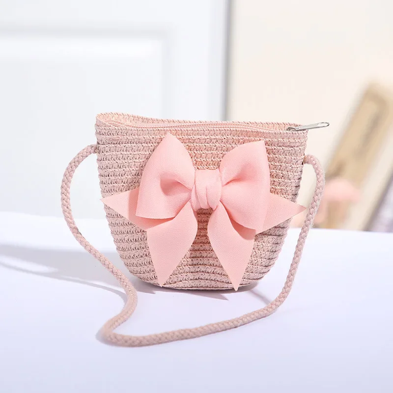 Bolso de paja con lazo para niña – estilo cruzado tejido a mano - imagen 3