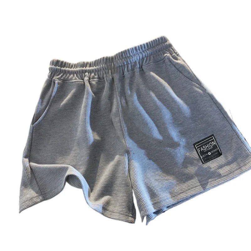 Pantalones cortos de pijama holgados con bolsillos en casa - imagen 3