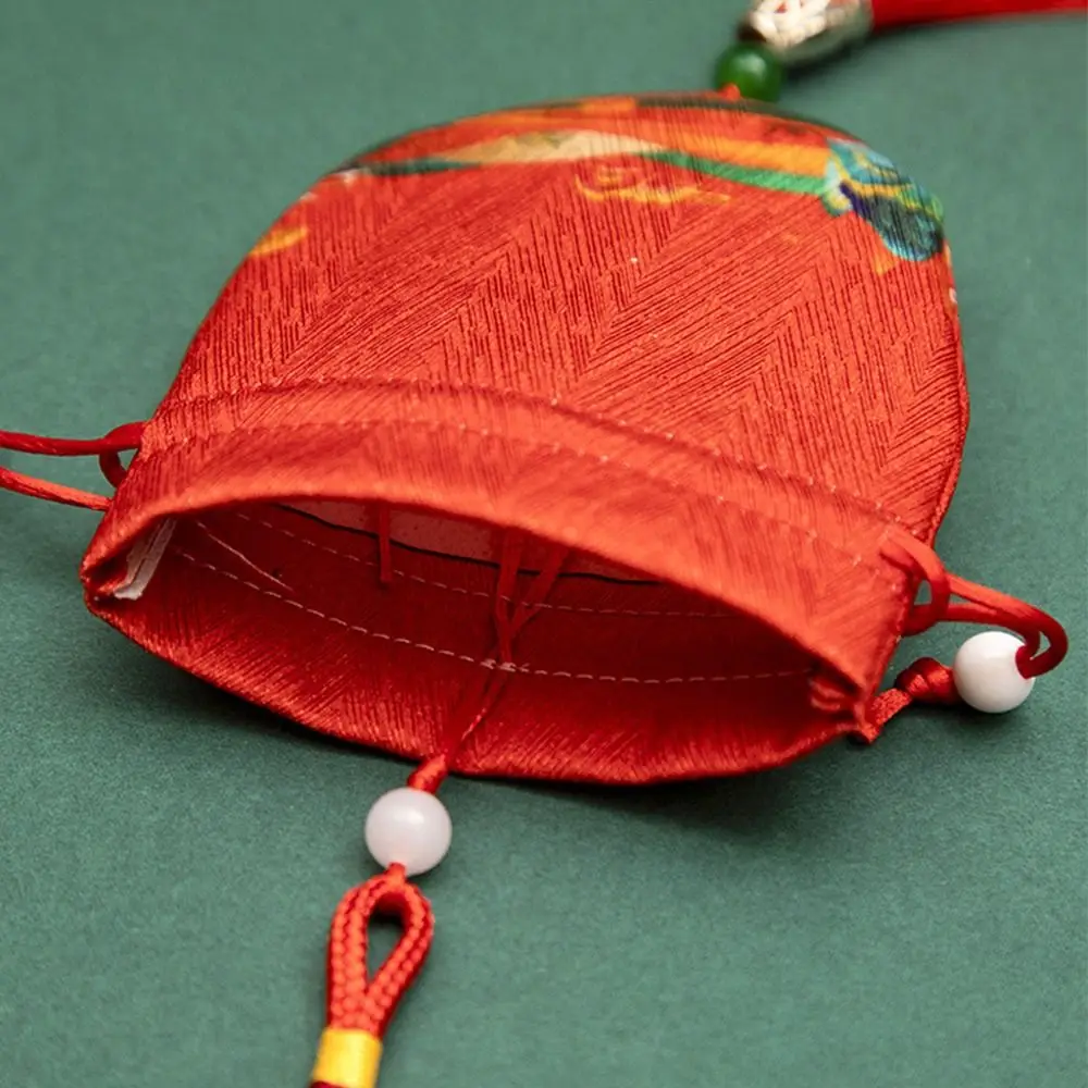 Bolsa de joyería con cordón y estampado floral