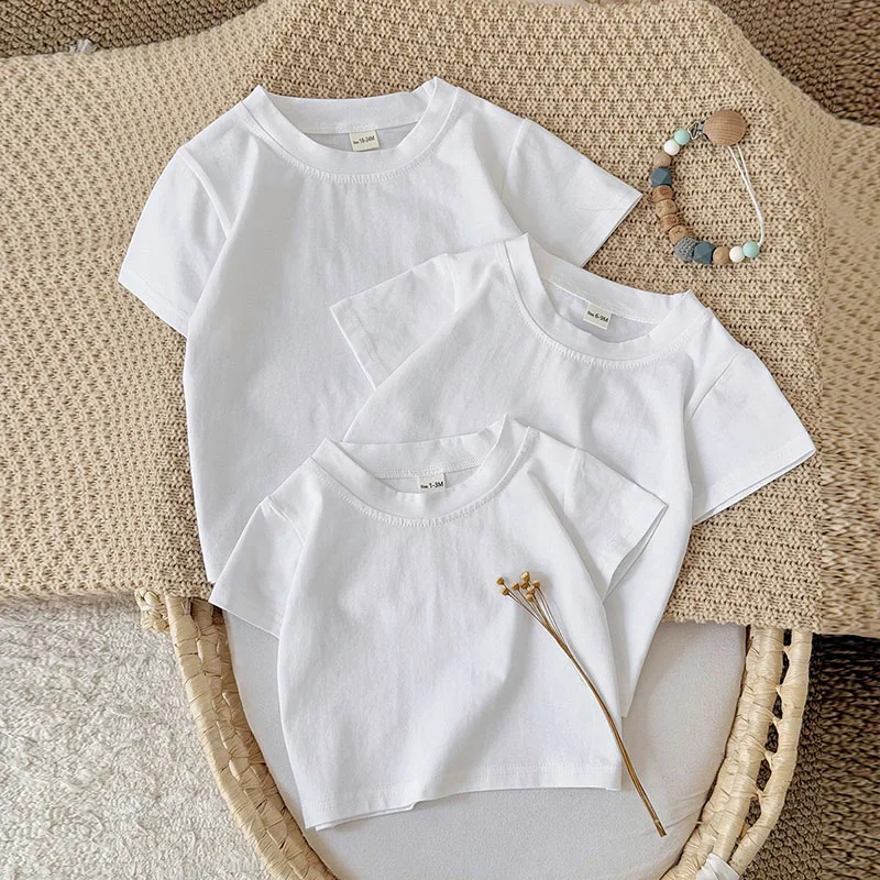 Camiseta blanca básica holgada para bebé