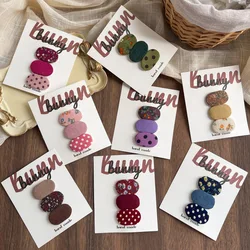 Pinzas para el pelo de bebé con diseño floral y tela