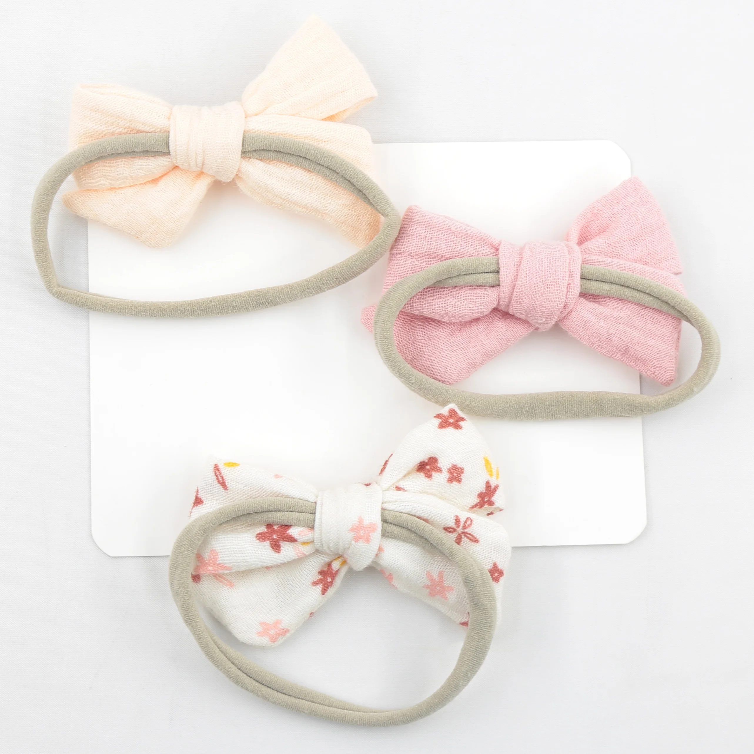 Diadema elástica de muselina para niña con lazo y estampado floral