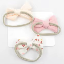 Diadema elástica de muselina para niña con lazo y estampado floral