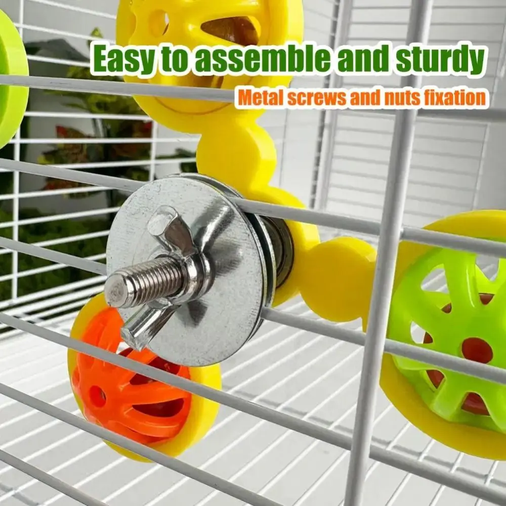 Rueda masticable para loros con campanas, giratoria e interactiva - imagen 2