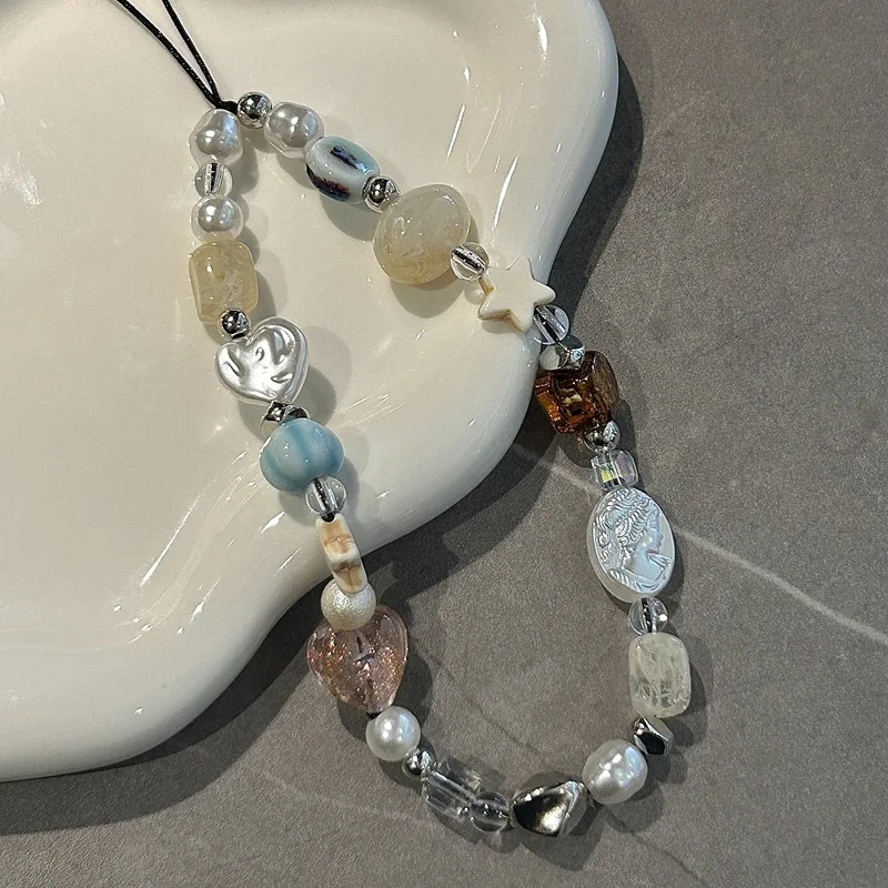 Cadena para móvil con perlas y charm antiestravío - imagen 4