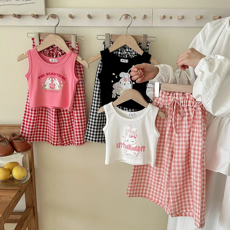 Conjunto infantil de verano con chaleco animal y pantalón a cuadros - imagen 5