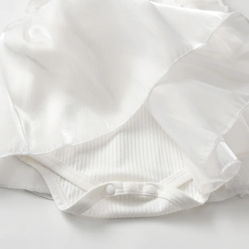 Mono de verano para niña blanco en malla sin mangas con lazo - imagen 4