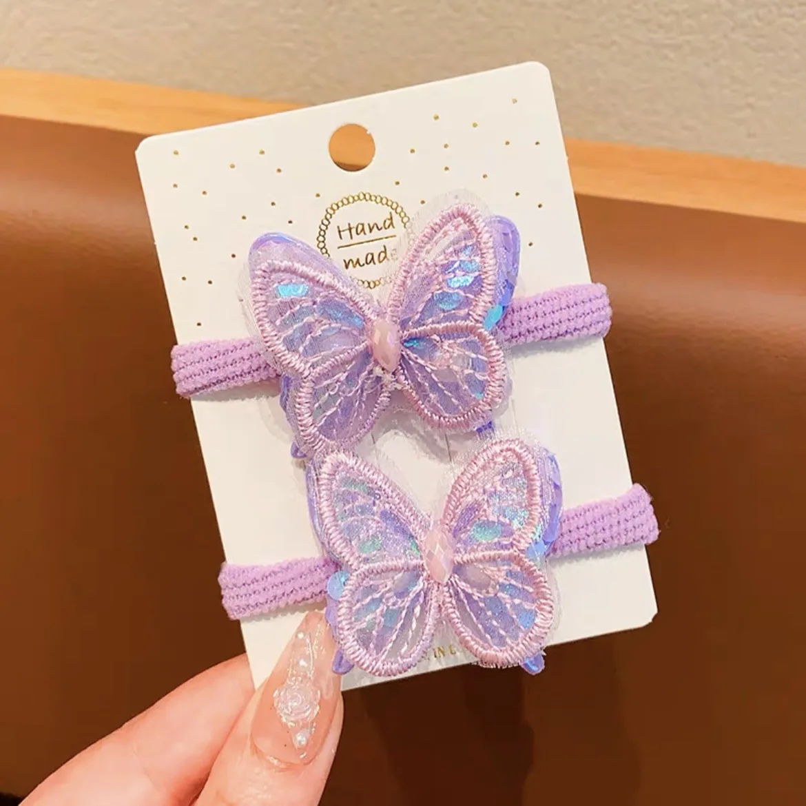 Banda para el cabello mariposa lentejuelas elástica niños caramelo - imagen 2