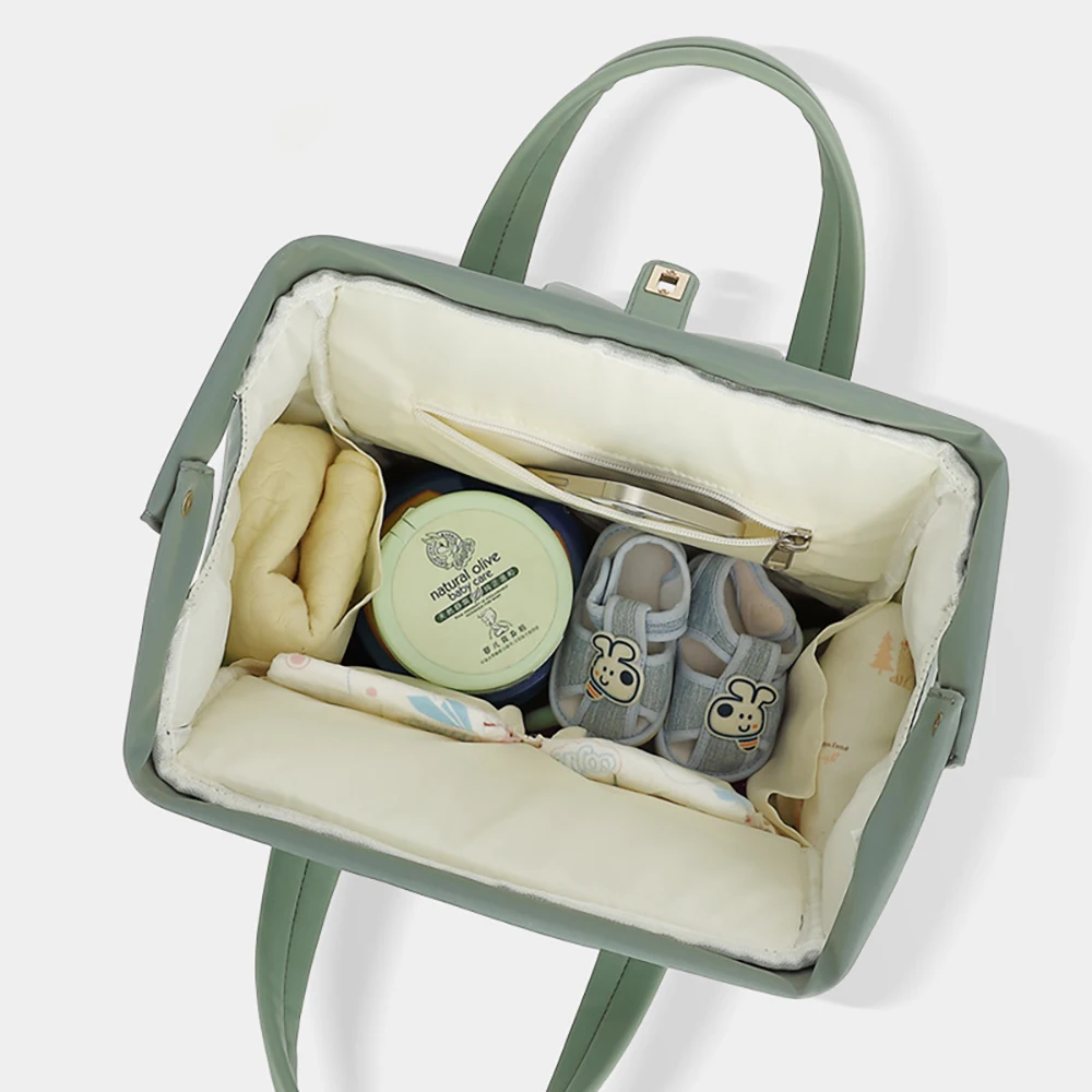 Bolsa de pañales verde salvia con mochila informal y muchos bolsillos - imagen 3
