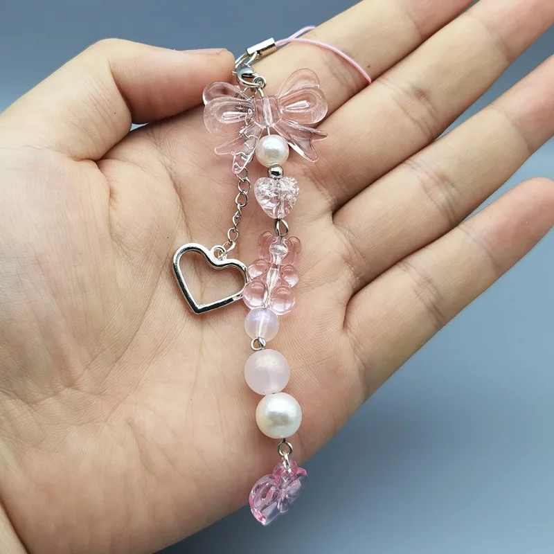 Abalorio para teléfono con lazo plateado rosa y colgante corazón - imagen 2