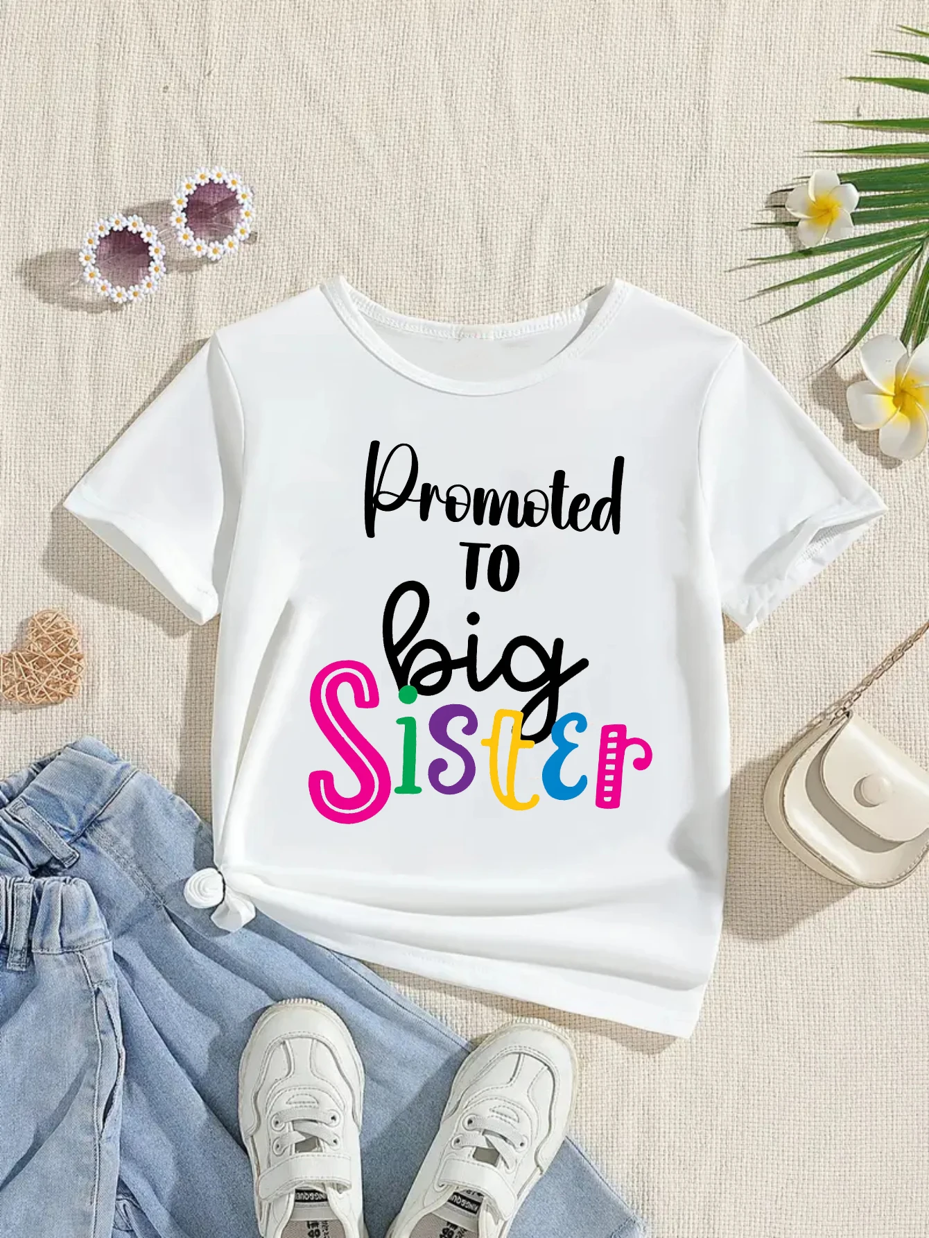 Camiseta bebé para anuncio embarazo hermana mayor con estampado