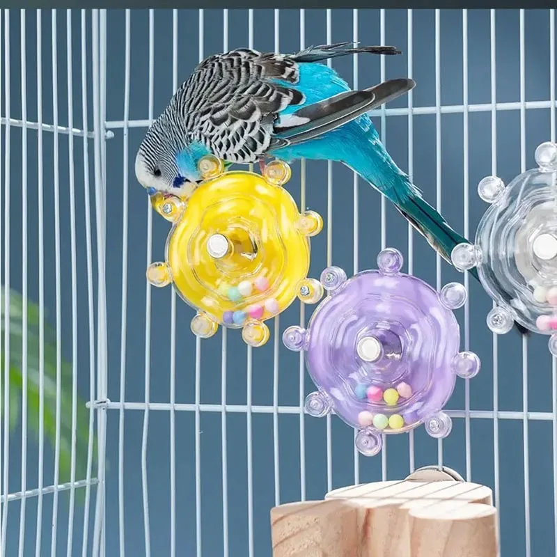 Juguete interactivo para loros con dispensador giratorio de premios