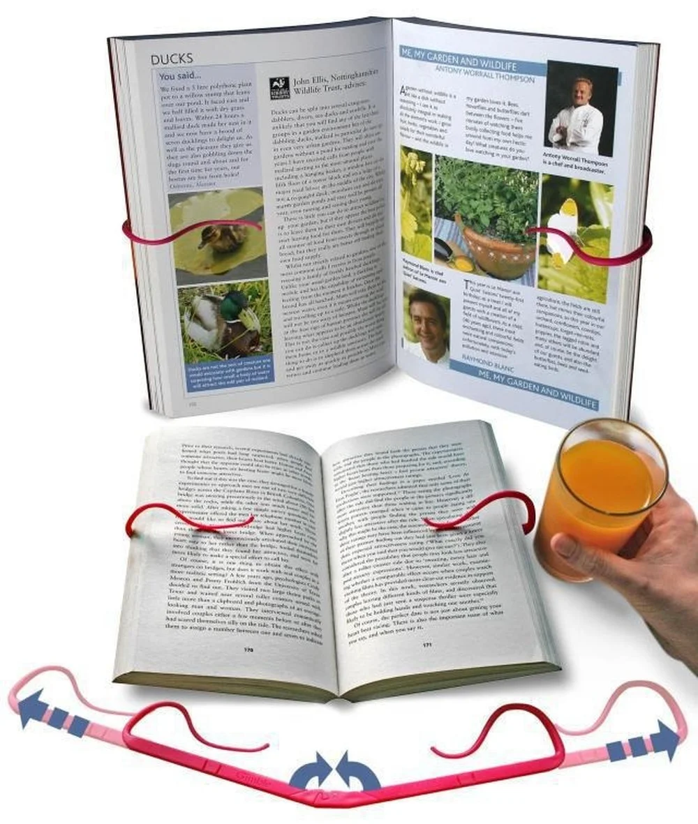 Producto en uso sobre escritorio con libro abierto