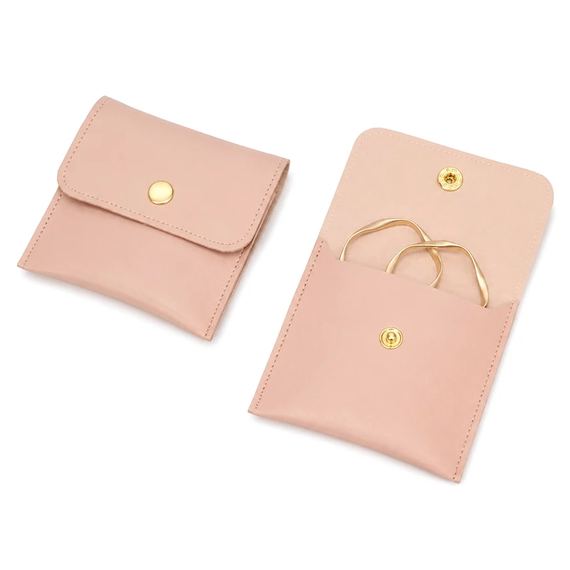 Bolsitas para joyas rosas con cierre, pendientes y pulseras - imagen 4