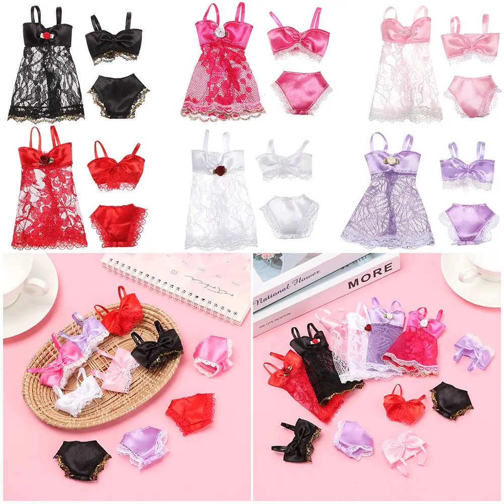 Conjunto de ropa para muñecas en tono rosa