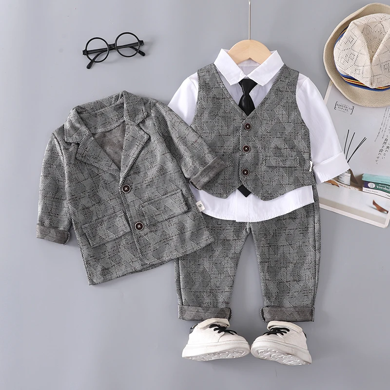 Conjunto niño otoño: abrigo, chaleco, camisa y pantalón