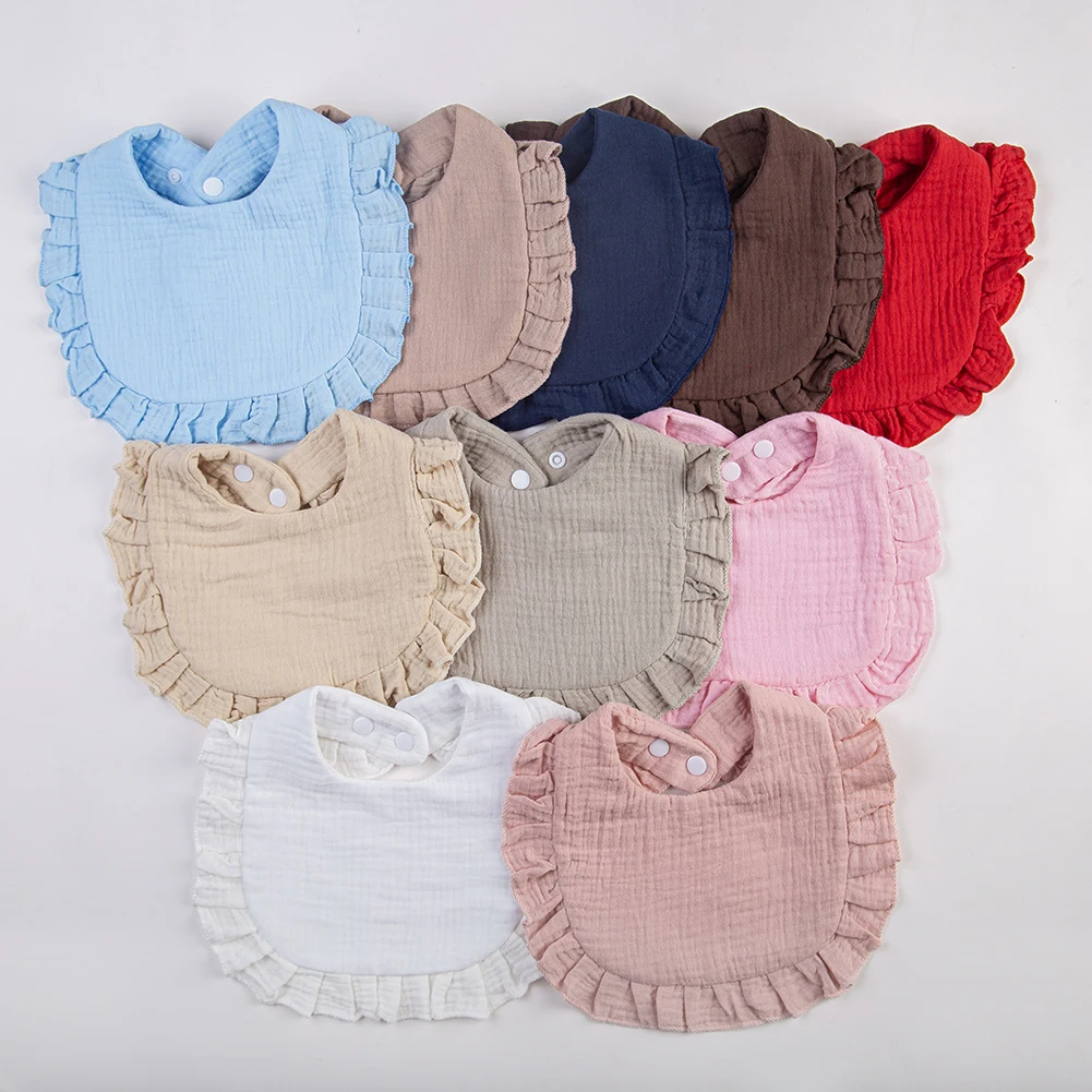Baberos y toalla de saliva con broche ajustable