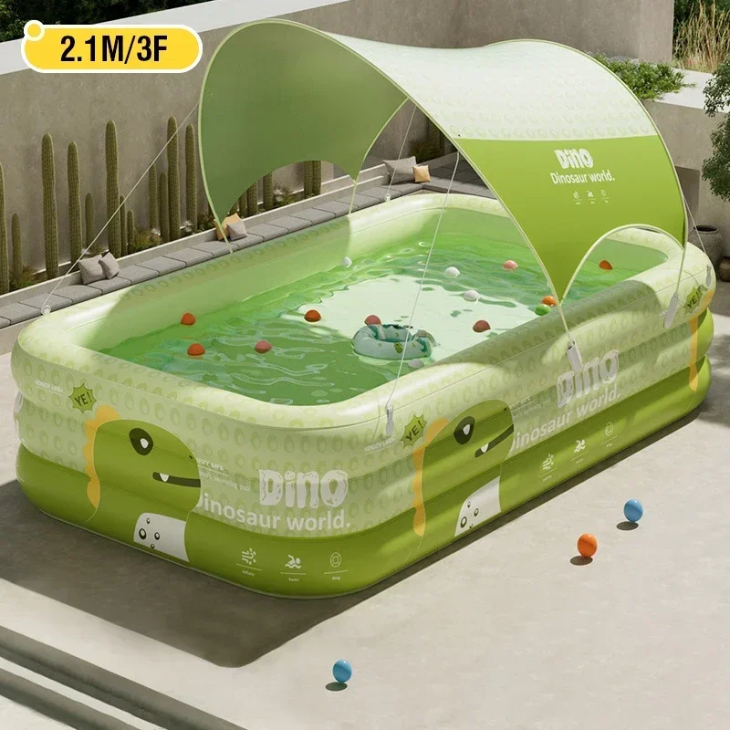 Piscina hinchable infantil de dinosaurios con parasol