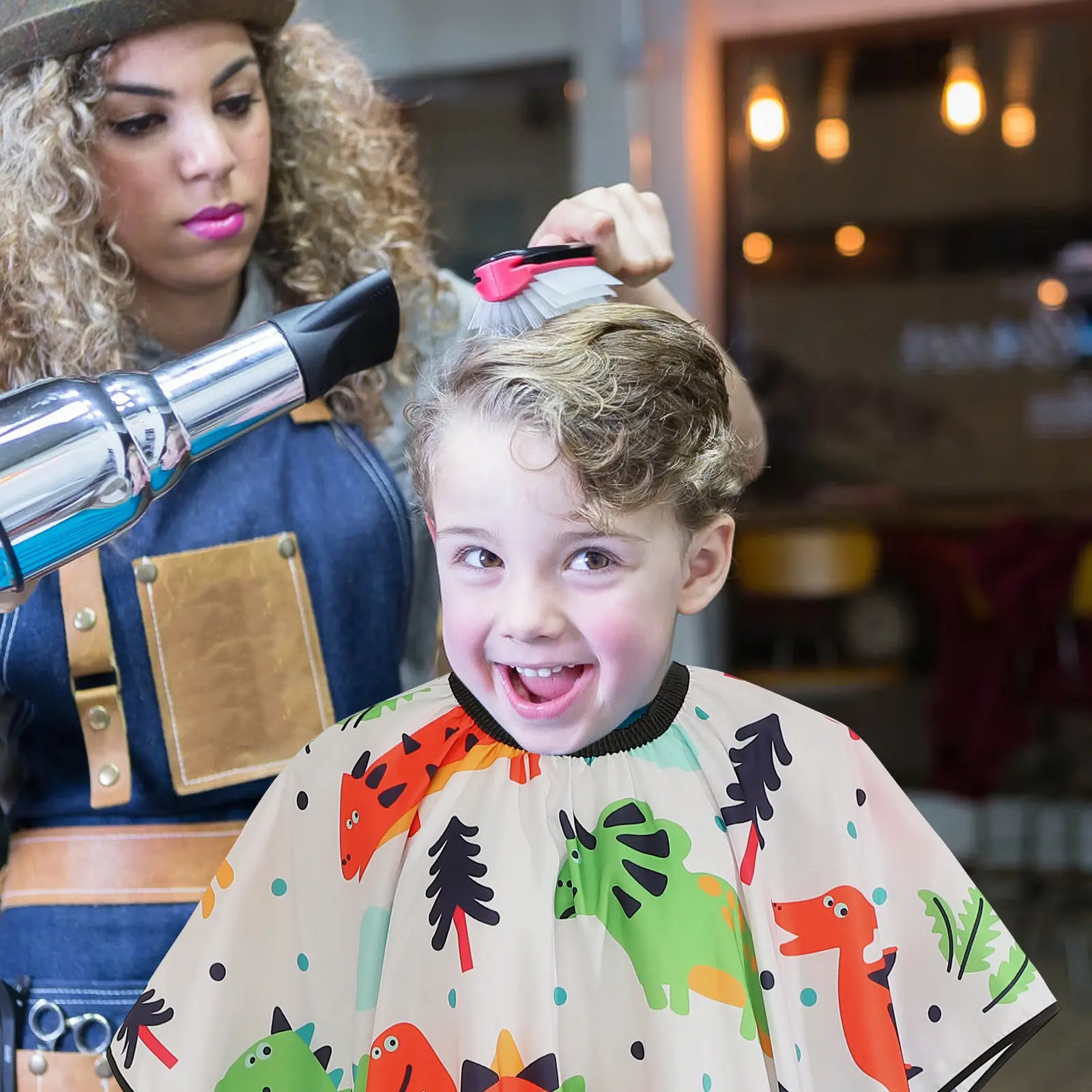 Capa para cortar el pelo infantil con dinosaurios plegable y ligera - imagen 3