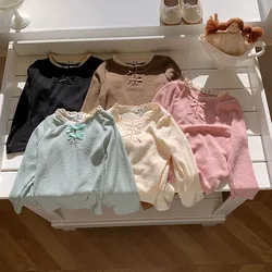Camiseta de manga larga para niñas con lazo y estilo otoñal