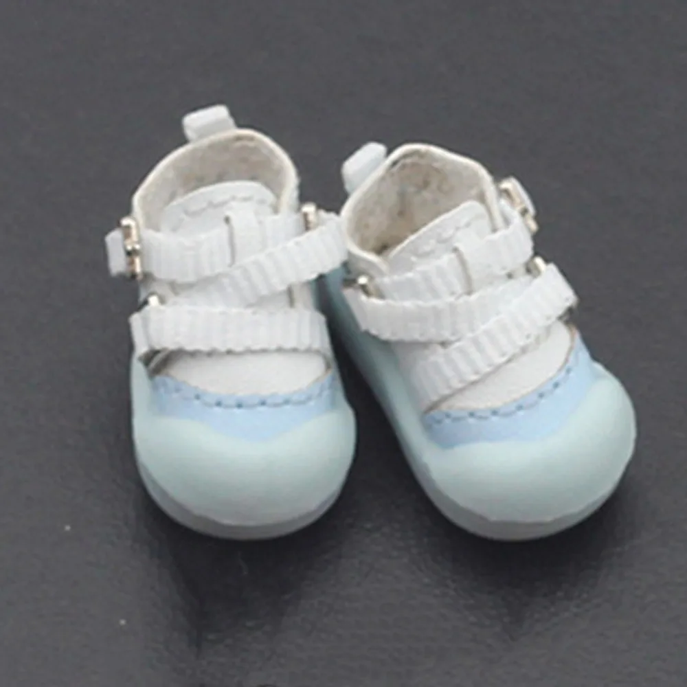 Par de zapatos para muñeca