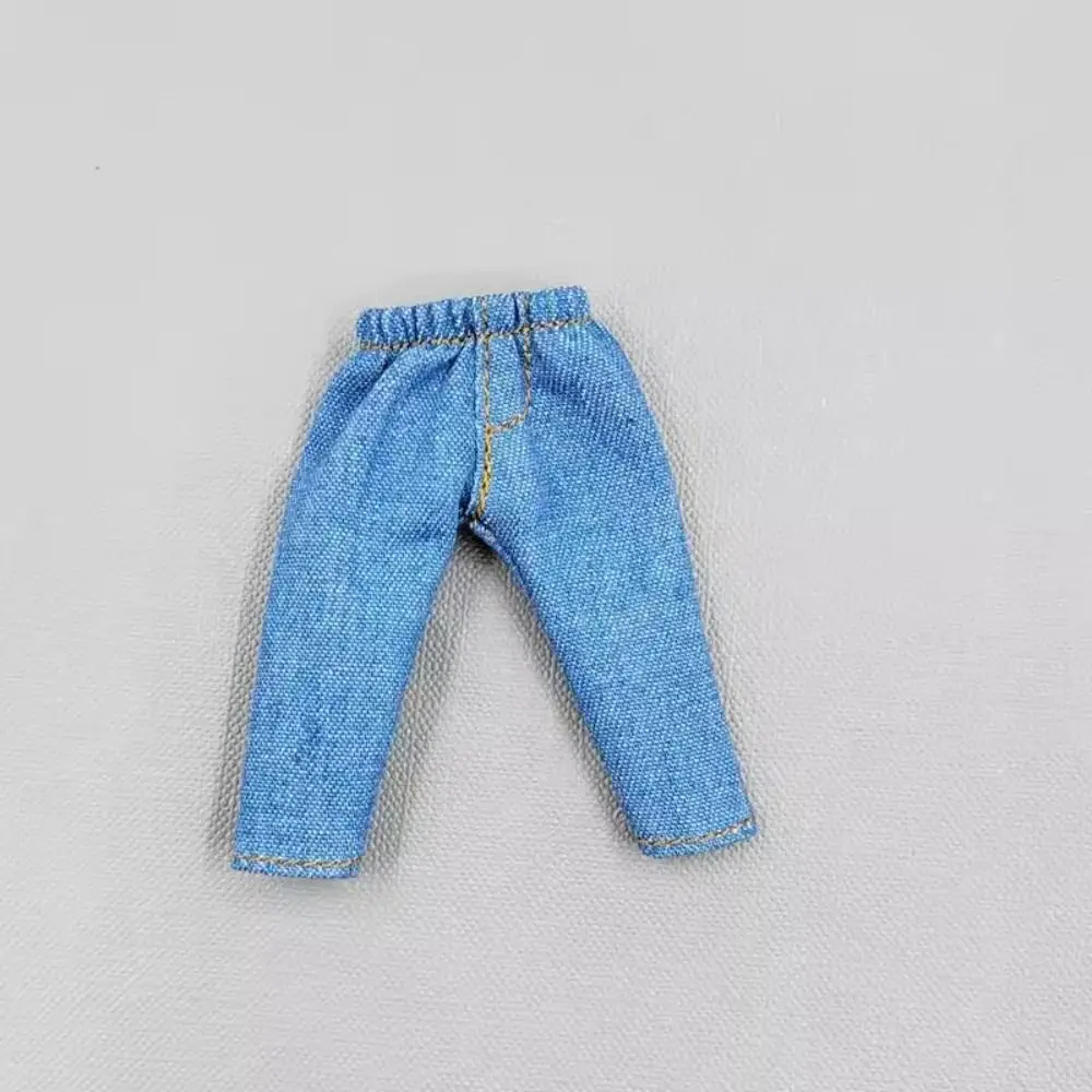 Vista frontal de los pants vaqueros para muñeca 1/11