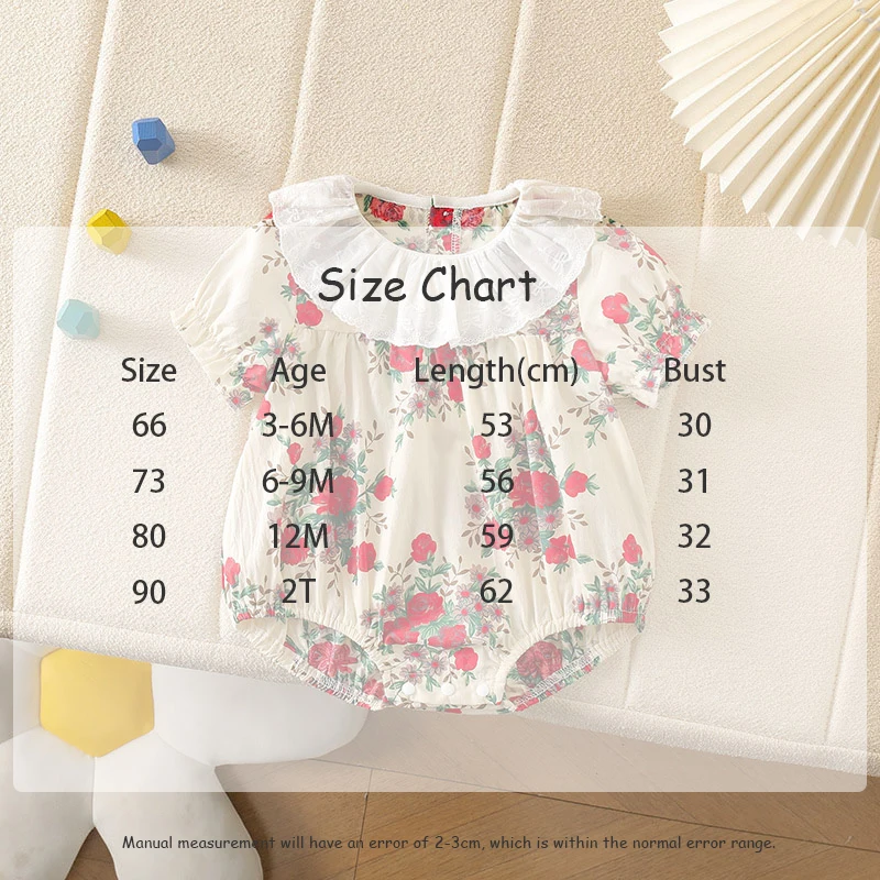 Body de verano para bebé con estampado floral de rosas sobre fondo crema