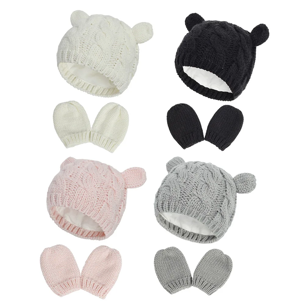 Gorro de punto con orejas y diseño infantil