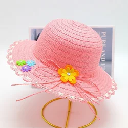 Sombrero de sol ala ancha en paja con flores, hecho a mano