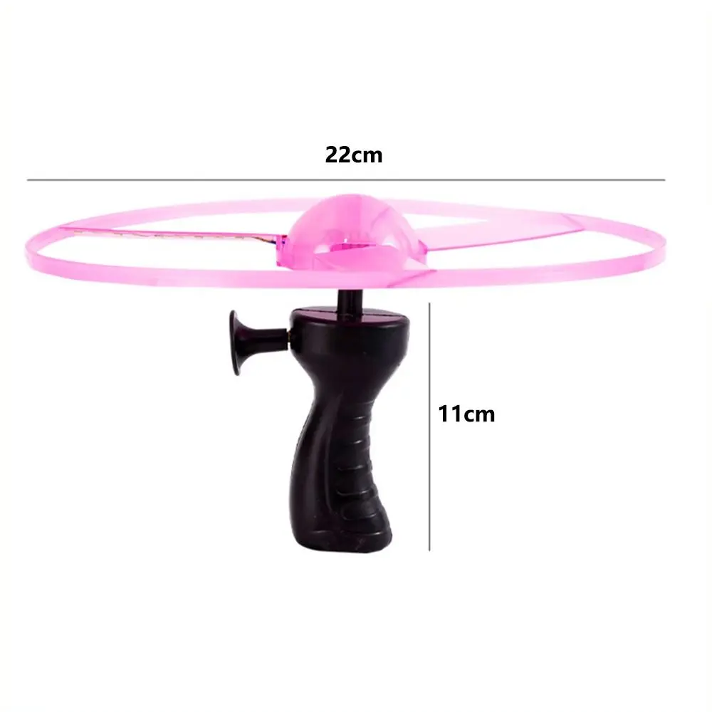 Juguete volante LED parpadeante con cuerda y giro para parques - imagen 5