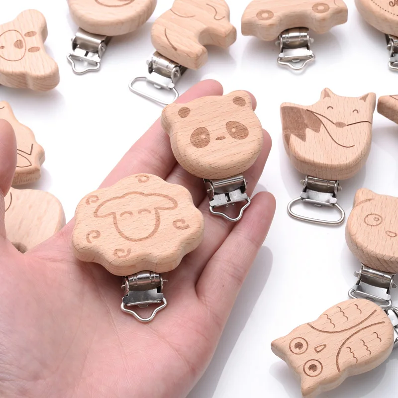 Clip para chupete con forma de animal Marino de madera de haya