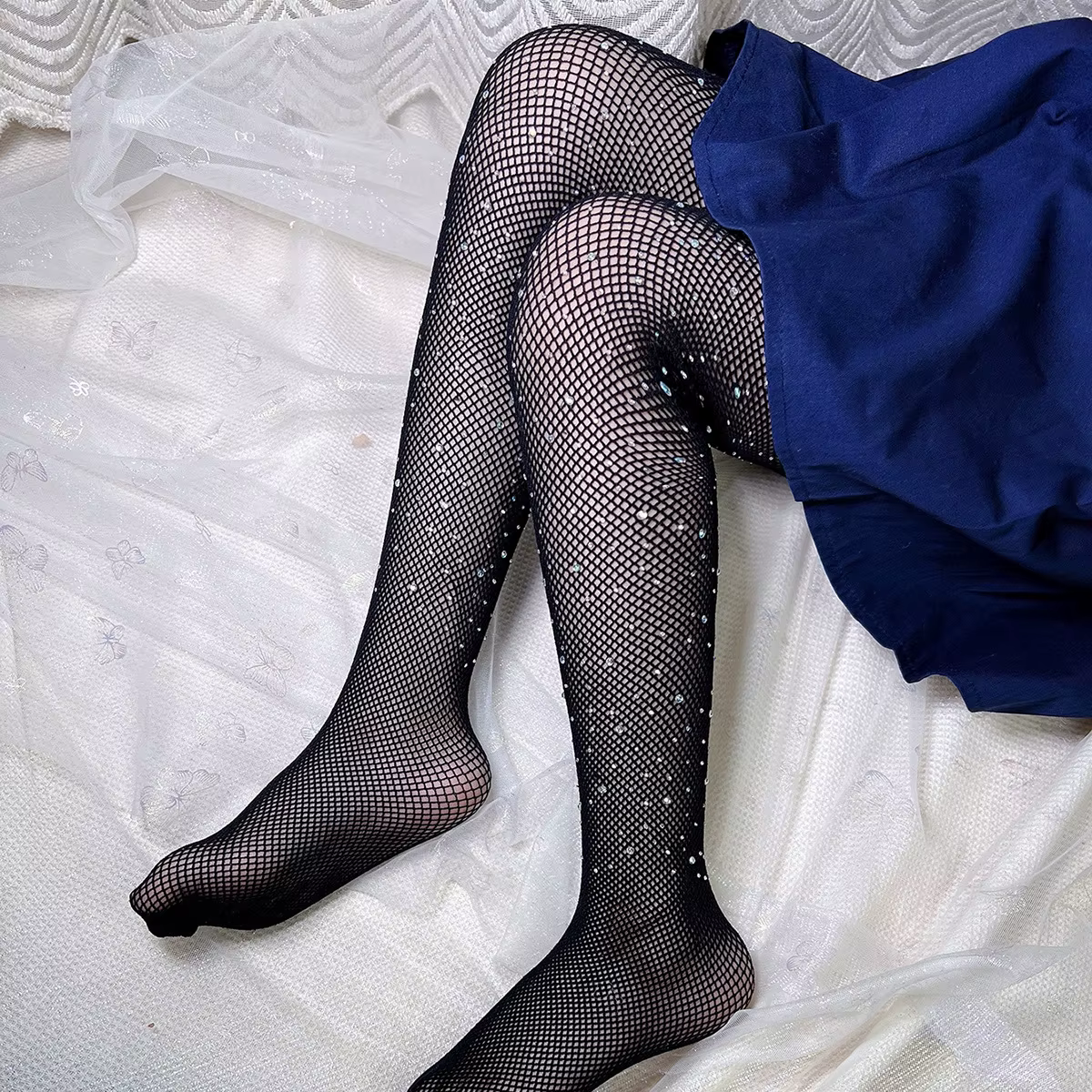 Pantimedias blancas con detalles en encaje y diamantes
