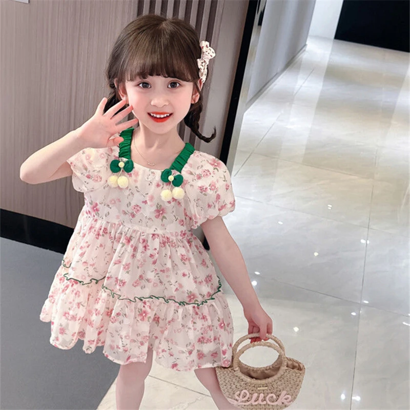 Vestido veraniego para niña con mangas abullonadas y estampado floral - imagen 2