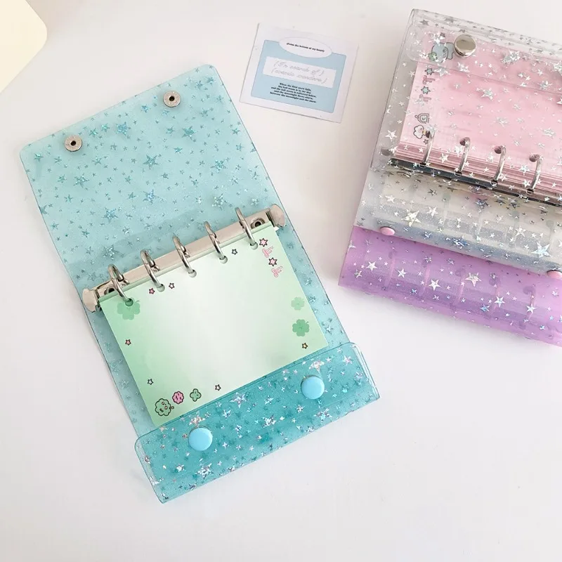 Carpeta transparente con estrella y hojas para cuaderno infantil