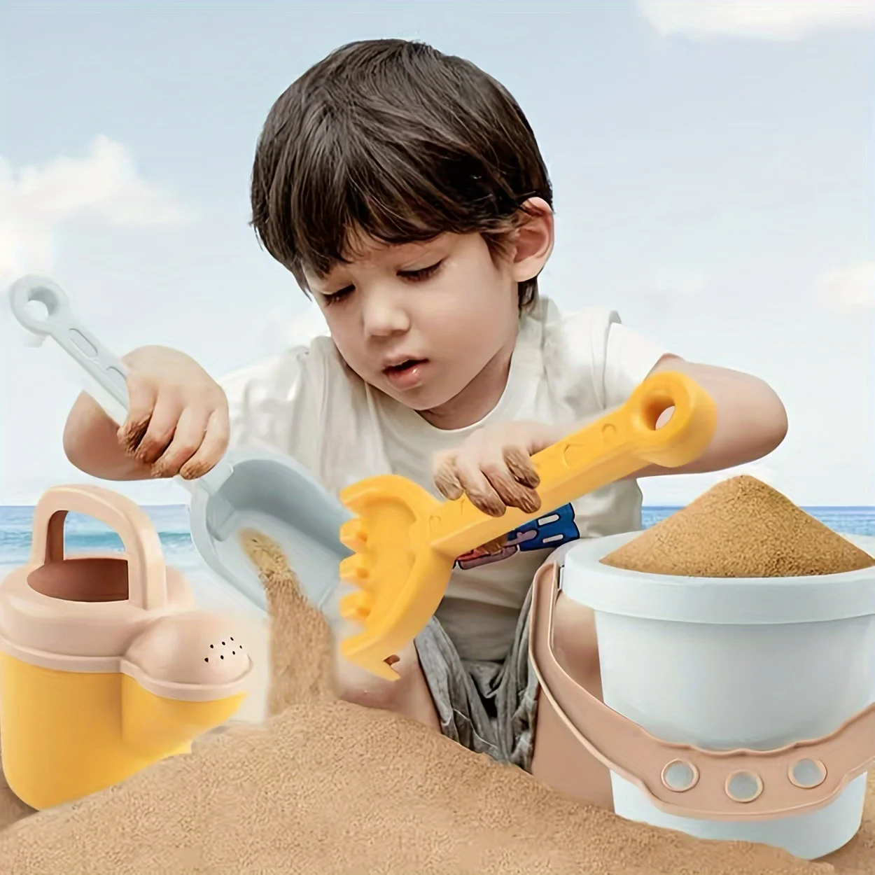 Juego de playa con cubo y herramientas