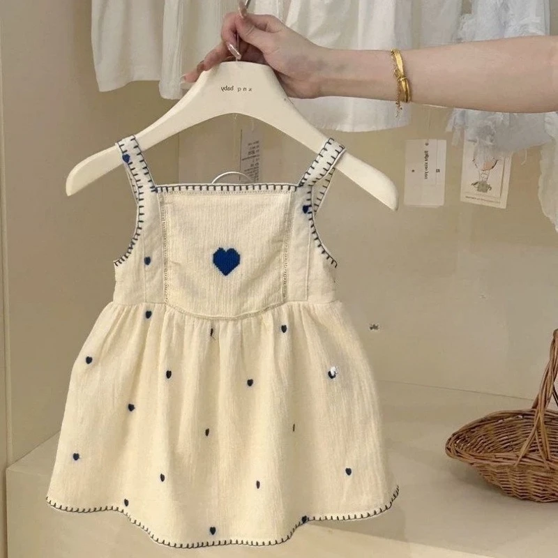 Vestido de verano niña estilo playero con tirantes bordados y encaje - imagen 3