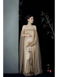 Vestido vintage de maternidad elegante para sesión fotos