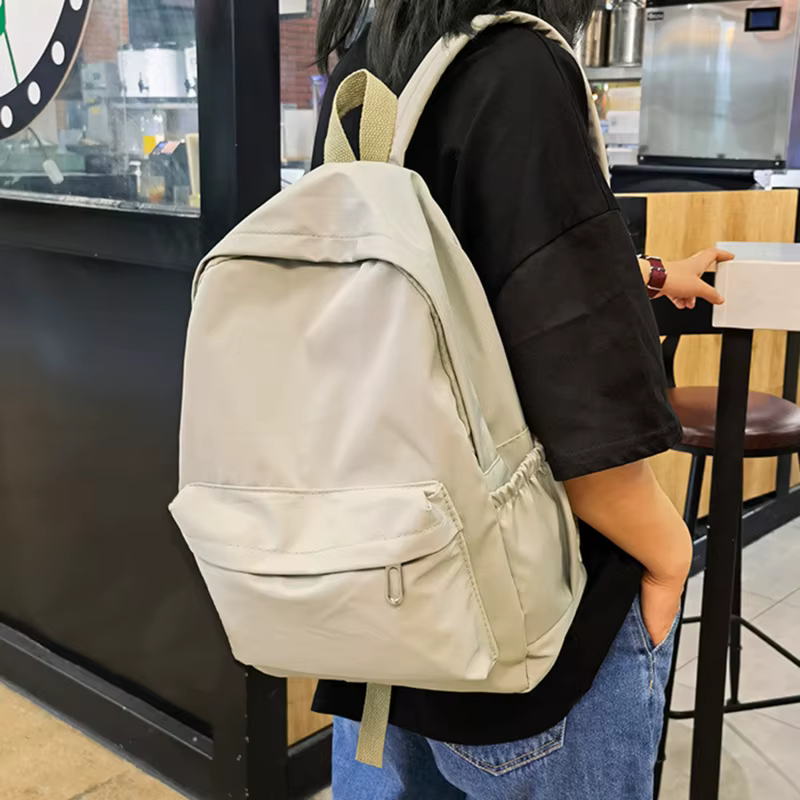 Mochila escolar impermeable de gran capacidad con cremallera