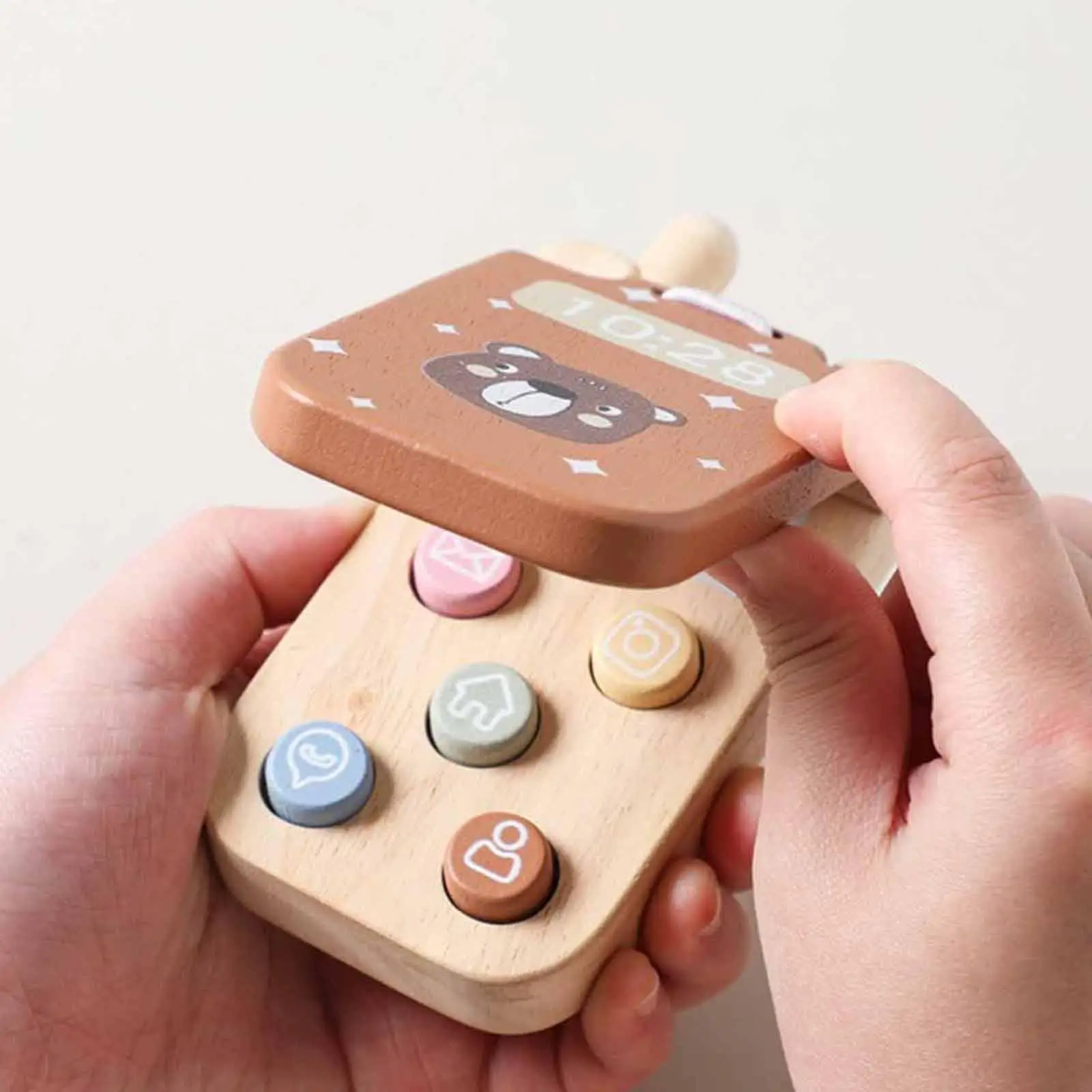 Teléfono de madera educativo para estimular la motricidad infantil - imagen 3